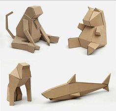 four different types of origami animals made out of cardboard boxes, one sitting and one standing