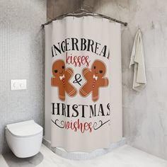 a bathroom with a shower curtain that says gingerbread kisses and christmas wishes