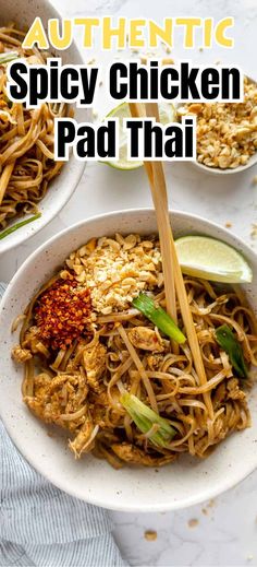 two bowls filled with spicy chicken pad thai noodles and topped with lime wedges on the side