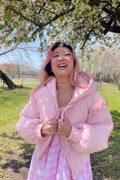 This super-cute pastel pink puffer features puffy bear ears, a gold zipper and buttons, and ruffle detailing on the sleeves. The Pink Marshmallow Bear Puffer is light enough for a cool Spring day and like the name implies - it's super fluffy like a marshmallow! Perfect for a day in the park or running errands in style. Model wearing size S. Pink Kawaii Outerwear For Winter, Fluffy Pink Spring Outerwear, Fluffy Pink Outerwear For Spring, Fluffy Hooded Spring Outerwear, Spring Fluffy Hooded Outerwear, Hooded Fluffy Outerwear For Spring, Trendy Pink Fluffy Outerwear, Spring Puffy Outerwear, Pink Long Sleeve Puffer Jacket With Zipper Closure