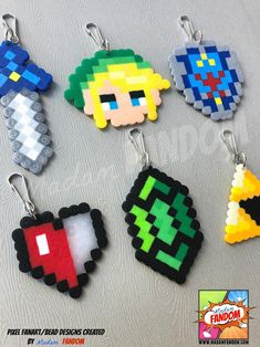 the pixel keychains have been made to look like video games characters