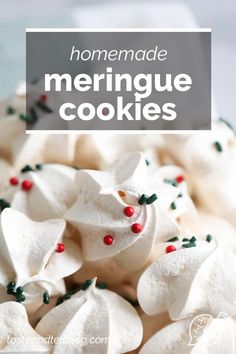 homemade meringue cookies with white icing and green sprinkles on top