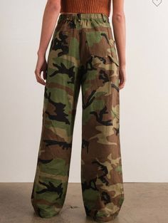 100% polyester cargo pants with button front and elastic waist. True to size, I am an 8/10 wearing a medium.Small 4-6Medium 8-10Large 12-14 Camo Cargo Pants, Cosmetic Items, Dressed Down, Hair Jewelry, Dress Accessories, Cargo Pants, Bralette, Camo, Elastic Waist