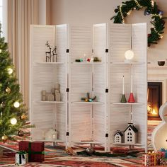 a room divider is decorated with christmas decorations