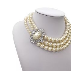 Beautifully made imitation Pearl necklace that has been made from glass. Great quality and beautifully designed. Elegant Round Glass Crystal Necklaces, Elegant Glass Crystal Necklaces For Party, Formal Pearl White Costume Jewelry Necklace, Adjustable Glass Necklaces For Formal Occasions, Elegant Glass Beaded Necklaces For Parties, Elegant Glass Beaded Necklaces, Elegant Glass Jewelry For Wedding, Elegant Glass Wedding Jewelry, Glass Necklaces For Weddings