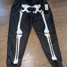 New Tipsy Elves Mens Scary Black Halloween Skelton Track Jogger Pants 38 X 29 Xl Amazing Jogger Scary Skelton Pants (Front And Back - Not The Cheap Ones )For You To Wear Before During And After Halloween Two Side Pockets And A Drawstring In Front Men’s Size Xl Currently Measures At 38 Inches Waist And 29 1/2 Inch Inseam Halloween Pants, Sweatpants Fit, Hoodie Romper, Red Sweatpants, Mens Onesie, Black Skeleton, Onesie Costumes, Chino Joggers, Tipsy Elves