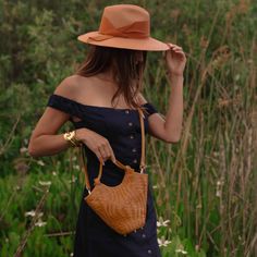 Handwoven leather handbag in a wavy, asymmetrical pattern Lined in microsuede and features 4 brass feet Handmade in India by artisans Dimensions: 17cm x 24cm x 10cm ITEM SHIPS DIRECTLY FROM THE VENDOR, PLEASE NOTE: - Oversized Shipping Cost: $20/Order(*Expedited Shipping & Local Pickup Not Eligible) (*Separate Charge from The Avenue Orders) - Return Policy: STORE CREDIT Asymmetrical Pattern, Womens Designer Bags, Mini Crossbody, Large Tote, Leather Handbag, Leather Handbags, Caramel, Bags Designer, Hand Weaving