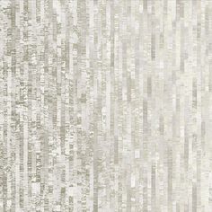 a white and grey wallpaper with vertical stripes