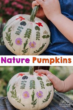 a kid holding a painted pumpkin with flowers on it and the words nature pumpkins