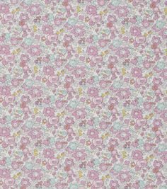 a pink and blue flowered wallpaper with small flowers