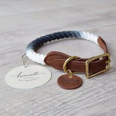 the personalized id tag included is attached to a leather dog collar with brass hardware