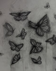 some black and white drawings of butterflies