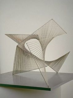 an abstract sculpture on top of a table