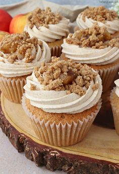 apple crumble cupcakes on a wooden platter