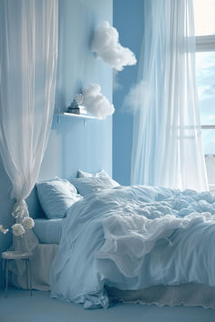 a bedroom with blue walls and white curtains