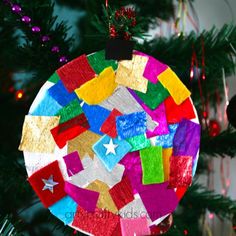 a christmas ornament made out of colored paper