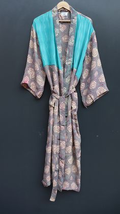 "Crepe Silk Kimono robes are perfect for lounging around the home or spa. Use our Cotton Sari robe as a cover up on the beach or after a dip in the pool. Add a luxe, boho feel to your bridal shower. Versatile, soft and luxurious, our Crepe Silk Kimono robes are printed with azo-free dyes. The Crepe Silk Kimono robe features Full sleeves, a waist tie and two front pocket. Length - 50 inches (125Centimeter), Measurements Approx : *Length: 50\" Inches *Bust Around Size: 52\" Inches *Shoulder: 28\" Long Sleeve Robe For Beachwear And Loungewear, Long Loungewear Robe With Tie Waist, Long Robe With Tie Waist For Loungewear, Long Summer Robe For Lounging, Long Summer Lounging Robe, Long Summer Robe For Sleep, Long Summer Sleep Robe, Comfortable Long Spring Sleepwear, Long Summer Sleepwear For Lounging