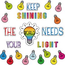 the words keep shining, the world needs light are surrounded by different colored lights bulbs