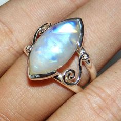 Blue Fire Rainbow Moonstone Ring, Natural Moonstone Ring, Gemstone Ring, Unique Ring,  Sterling Silver Ring, Birthday Gift Ring, Women Rings Gemstone - Blue Fire Rainbow Moonstone  Metal - 925 Sterling Silver Weight- 6.5 gm Approx Stone Size- 10x20mm This item is made to order.  We will make the item in 3 to 5 business days after confirmation of order and will be shipped directly from India.  The pictured gemstone will not be sent, we will pick similar  gemstone to make your order. Gemstones are Magical Round Moonstone Ring, Mystical Moonstone Ring For Anniversary, Mystical Cabochon Moonstone Ring Gift, Mystical White Moonstone Ring In Moon Shape, Mystical White Moonstone Moon-shaped Ring, Mystical Round Moonstone Ring Gift, Mystical Round Moonstone Ring As Gift, Mystical White Moon-shaped Moonstone Ring, Mystical Moonstone Anniversary Ring