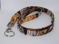 Makes a great gift!This is Realtree camouflage fabric.All items are made with 4 layers of 100% cotton with an inner layer of fleece making them very comfortable and durable.  No more sharp edges, just quilted comfort.Lanyards are 1/2 inch wide and approximately 40 inches around making them about20 inches long with a silver metal swivel clasp and a split key ring. The swivel clasp adds 1.5 inches to the length of the lanyard.The Skinny Wristlets are 1/2 inch wide with a 6 inch loop and a silver m Camo Lanyard, Snow Camo, Real Tree Camouflage, Country Jewelry, Phone Wristlet, Teacher Lanyard, Digital Camo, Gray Camo, Woodland Camo