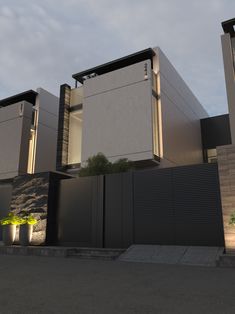 an architectural rendering of a modern house with large windows and doors on the side of it