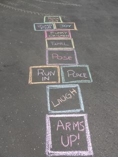 some chalk writing on the ground with words written in it