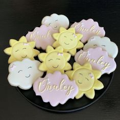 some cookies that are sitting on a plate with the words bradley and smiley written on them