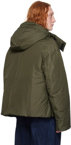 Insulated nylon ripstop jacket. · Bungee-style drawstring at detachable hood · Funnel neck · Two-way zip closure · Welt pockets · Concealed bungee-style drawstring at hem and cuffs · Zip vent at side seams · Welt pocket at interior · Full polyester satin lining Supplier color: Khaki Nylon Hooded Jacket With Ykk Zipper, Nylon Parka With Zipper Closure For Cold Weather, Nylon Parka With Zipper Closure For Outdoor, Utility Nylon Outerwear With Double-lined Hood, Urban Nylon Utility Jacket With Detachable Hood, Utility Hooded Parka With Zipper Closure, Functional Nylon Parka With Zipper Closure, Urban Nylon Parka For Cold Weather, Hooded Nylon Utility Outerwear