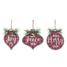 three christmas ornaments with the words joy, peace and merry hanging from strings on a white background