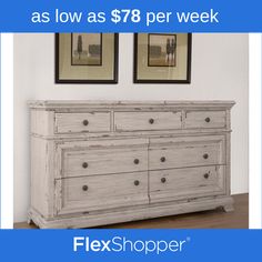 a white dresser with two framed pictures on the wall and below it is an advertisement for flexshoper