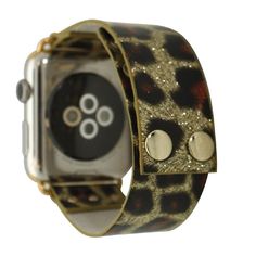 Glossy Animal Buckle Apple Watch Band from Olivia Pratt is unique and durable featuring a glossy, leopard print material and buckle closure, this is the perfect accessory for your Apple Watch.Olivia Pratt is always looking after new designs to improve your style! Using the best quality materials available in all of our products to ensure long durability in your every day wear. Please be aware, color vibrancy of the product might change from device to device. If you have questions we're here to h Trendy Gold Watch Accessories With Leather Strap, Trendy Gold Watch With Leather Strap, Trendy Adjustable Brown Watch Accessories, Trendy Adjustable Rectangular Watch Accessories, Watch Safes, Improve Your Style, Technology Accessories, 38mm Apple Watch Band, Wearable Tech