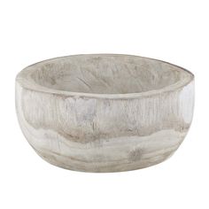 a white bowl sitting on top of a table