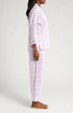 These ultrasoft pajamas take a modern turn with breathable cotton covered in an eye-catching print. 27" top length; 26" inseam Top has front button closure; notched collar; long sleeves Pants have elastic/drawstring waist 100% cotton Machine wash, line dry Imported Printed Relaxed Fit Sets For Daywear, Cotton Sleepwear With Character Print In Multicolor, Multicolor Cotton Graphic Print Sleepwear, Cotton V-neck Sleepwear With Floral Print, Spring Multicolor Floral Print Sleepwear, Playful Printed Cotton Sleepwear, Cotton Pyjamas, Drawstring Waist, Pajamas