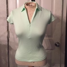 This Is A Cute Every Day Wear Top. It Has An Invisible Zipper In The Front Which Zips Down To 7 Inches. It Is 95% Cotton And 5% Spandex Which Is Also Made Here In The Usa Size Is Extra Small With A Total Length Of 19 Inches. And 11 Inches From Armpit. Color Is A Light Lime Green. Please Feel Free To Ask Any Questions And Thank You For Checking Out My Closet. Classic Fitted Green Tops, Invisible Zipper, Cute Tops, Lime Green, Womens Tops, Green, Women Shopping, How To Wear, Color