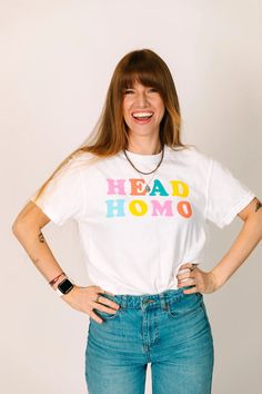 "Head Homo" screen-printed white shirt. Let the people know who the Head Homo in town is really is with this fun and colorful shirt. Pre-shrunk, soft washed, garment dyed fabric Designed and made in New Orleans Unisex sizing Size Chart: (in inches) S M L XL 2XL 3XL Sleeve Length 8 8 ¼ 9 9 ½ 9 ¾ 9 ¾ Full Body Length 27 28 ½ 30 31 ½ 32 ¾ 33 Body Width 18 ½ 20 ½ 22 ½ 24 ½ 26 ½ 28 Full Body, White Shirt, Size Chart, Fabric Design, Screen Printing, Colorful Shirts, Dye, Sleeve Length, Fabric