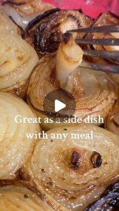 onions being cooked with tongs in a bowl