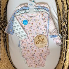 Crafted In Snuggly Soft Cotton With Long Sleeves, This Pack Of Bodysuits Is The Perfect Starter To Any Little Outfit! Features: -4-Pack -Long Sleeves -Overlap Shoulders For Easy Over The Head (Envelope Neck) -Strong Inseam Snaps Keep Up With Wear, Wash, Repeat -Fabric & Care: -100% Cotton Rib -Machine Washable Size: 6 Months (24" - 27" Height, 12.5 - 17 Lbs) Cute Long Sleeve Blue Bodysuit, Fitted Pink Onesie For Bedtime, Cute Long Sleeve Bodysuit For Bedtime, Fleece Hoodie Outfit, Pink Overalls, Green Flannel, Baby Girl Shorts, Baby Bundles, Boys Romper