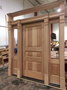 an unfinished wooden door is being worked on