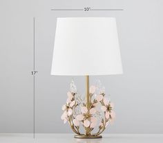 a table lamp with a white shade on it and measurements for the lampshade