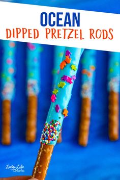 an ocean dipped pretzel rods with sprinkles