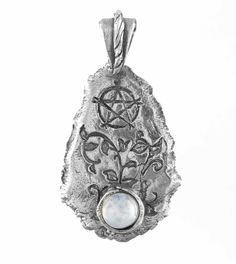 Material: 99.9% pure silver (also called "Fine Silver"), handmade out of metal clay silver, with natural rainbow moonstone Weight: 5.1 grams 100% Handmade - I work with pencil, paper, and carving tools. No software, AI or 3D printers are ever used in my handmade pendants. Size: About 3/4 inch wide x 1-3/8 inch tall including integral bail (20 x 35 mm) The bail is fixed in place. Item number: wh010 A lustrous rainbow moonstone cabochon is set in a teardrop-shaped pendant. The edge of the pendant Jewelry Smithing, Clay Silver, Necklace Length Guide, Moonstone Cabochon, Metal Clay Jewelry, Casting Jewelry, Feather Pendant, 3d Printers, Natural Rainbow