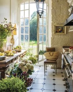 an instagram page with the image of a kitchen and dining room in french style