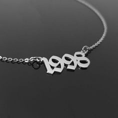 Personalize your style wearing this beautiful necklace with your year of birth or other significant year in your life. Are you or someone you know a 90s' babe? Or 2000s chick? We've got you covered! Gold and platinum plated: *tarnish-free* Old English Font: years 1990 - 2008 Chain: 36cm + 7cm extender Pendant size: 12mm x 24mm (2-3cm) Ships from the USA 🇺🇸 Birth Year Necklace, Year Necklace, Date Necklace, Jewlery Necklace, Old English Font, Number Necklace, Birth Year, Anniversary Jewelry, Chains Necklaces