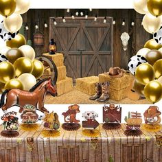 an image of a birthday party with decorations and horse figurines on the table