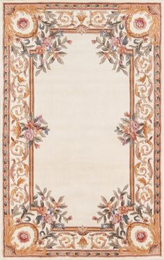 a white rug with an ornate border and flowers on the bottom, in front of a beige background