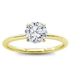 a yellow gold engagement ring with a round diamond in the center, on a white background