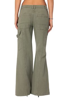 A more minimalist take on the utility trend, these nonstretch carpenter jeans feature a low-rise waist, wide flare legs and a cool earthy wash. Zip fly with button closure Front slant pockets; back patch pockets: cargo patch pockets 100% cotton Machine wash, dry flat Imported Fall Utility Flare Jeans Full Length, Fall Utility Flare Jeans, Relaxed Fit Flare Jeans With Cargo Pockets, Spring Utility Wide Leg Flare Jeans, High Rise Cotton Utility Flare Jeans, Utility High Rise Cotton Flare Jeans, Utility Style High Rise Cotton Flare Jeans, Mid-rise Cotton Utility Flare Jeans, Mid-rise Cotton Flare Jeans In Utility Style