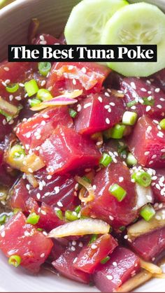 the best ever homemade tuna poke with sesame seeds and green onions in a white bowl