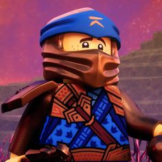 the lego ninja is wearing a blue helmet