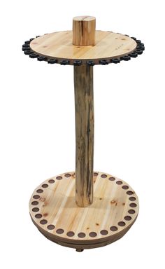 a wooden table with two circular holes on the top and one hole in the middle